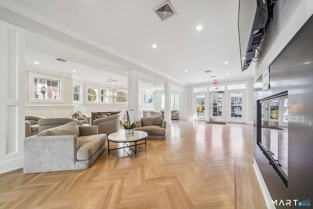 Welcome to 85 Camp Ave in Stamford, CT, a bright and well maintained tri level townhouse located in the highly desirable Springdale neighborhood.