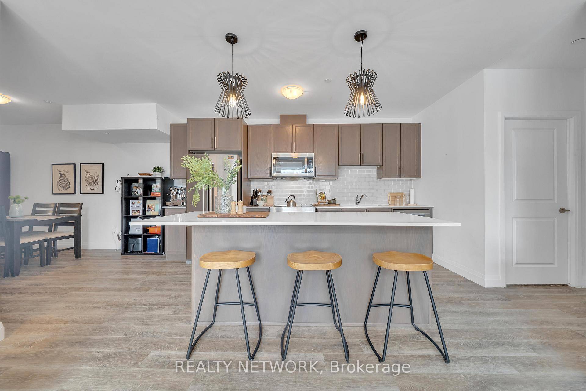Experience modern condo living at its finest in the beautiful Scenic Trails community.