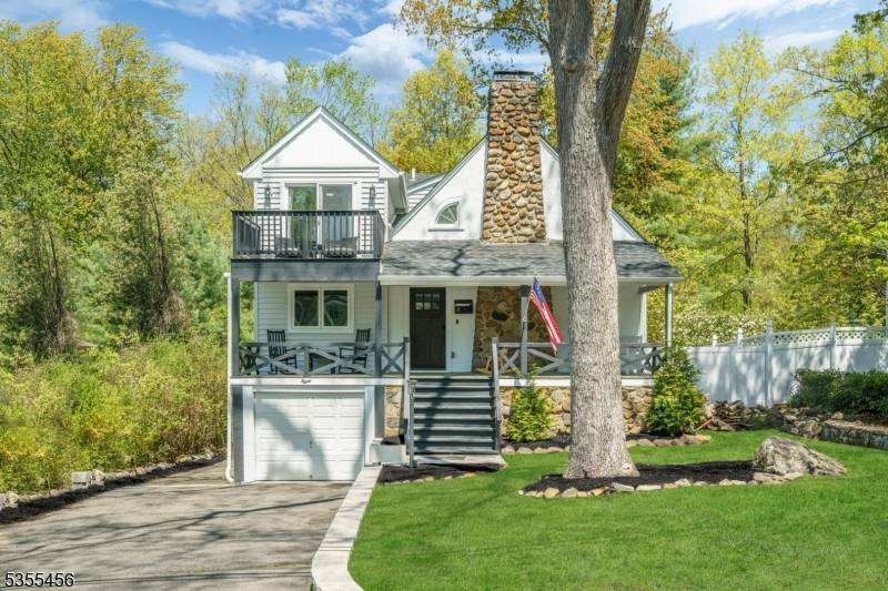 Welcome to 8 Mountainside Drive, a beautifully renovated smart home in the heart of Lake Packanack, completely transformed in 2023.