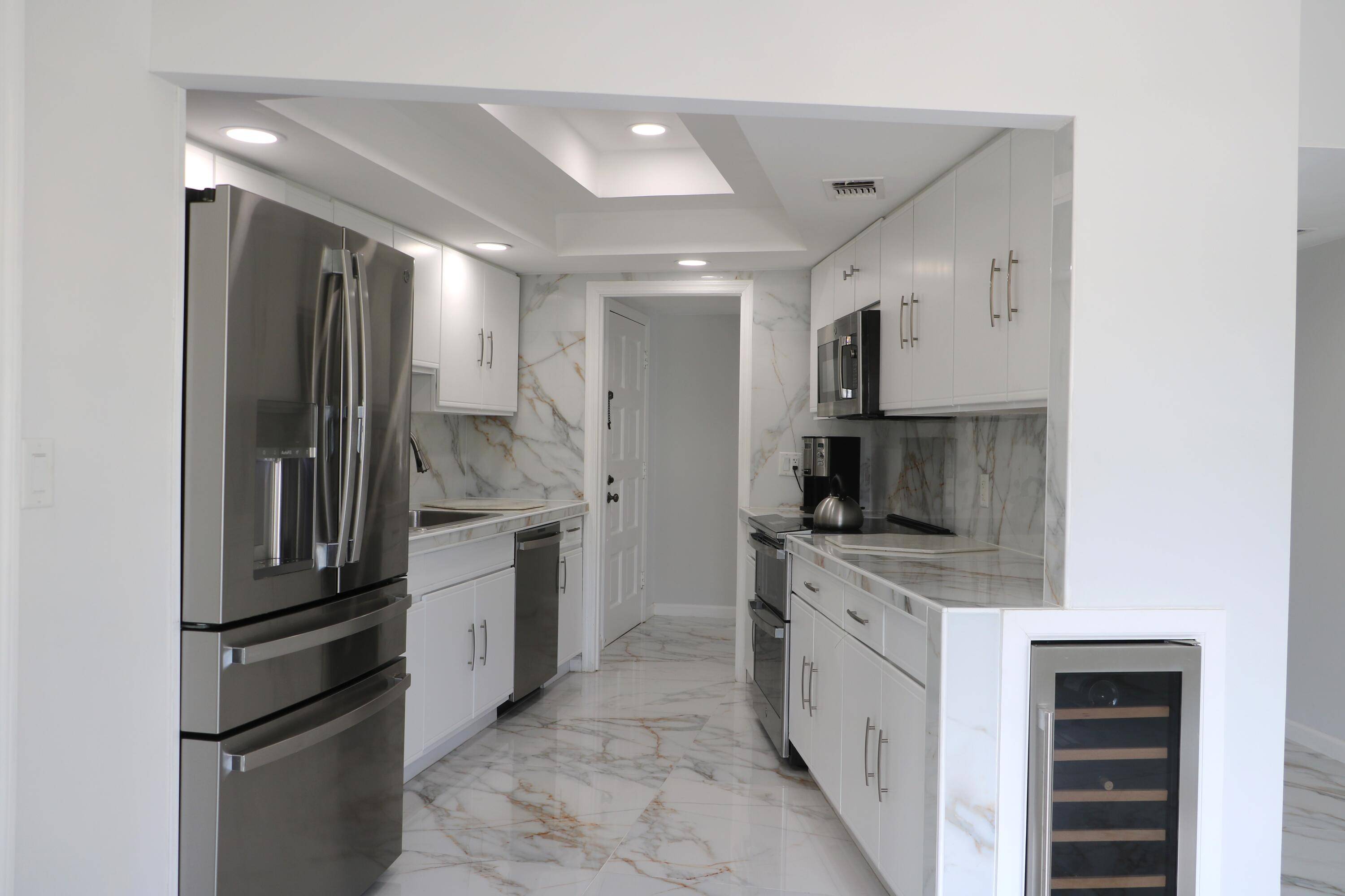 This stunning, fully renovated apartment is the largest in the building offering spacious living with modern upgrades throughout.