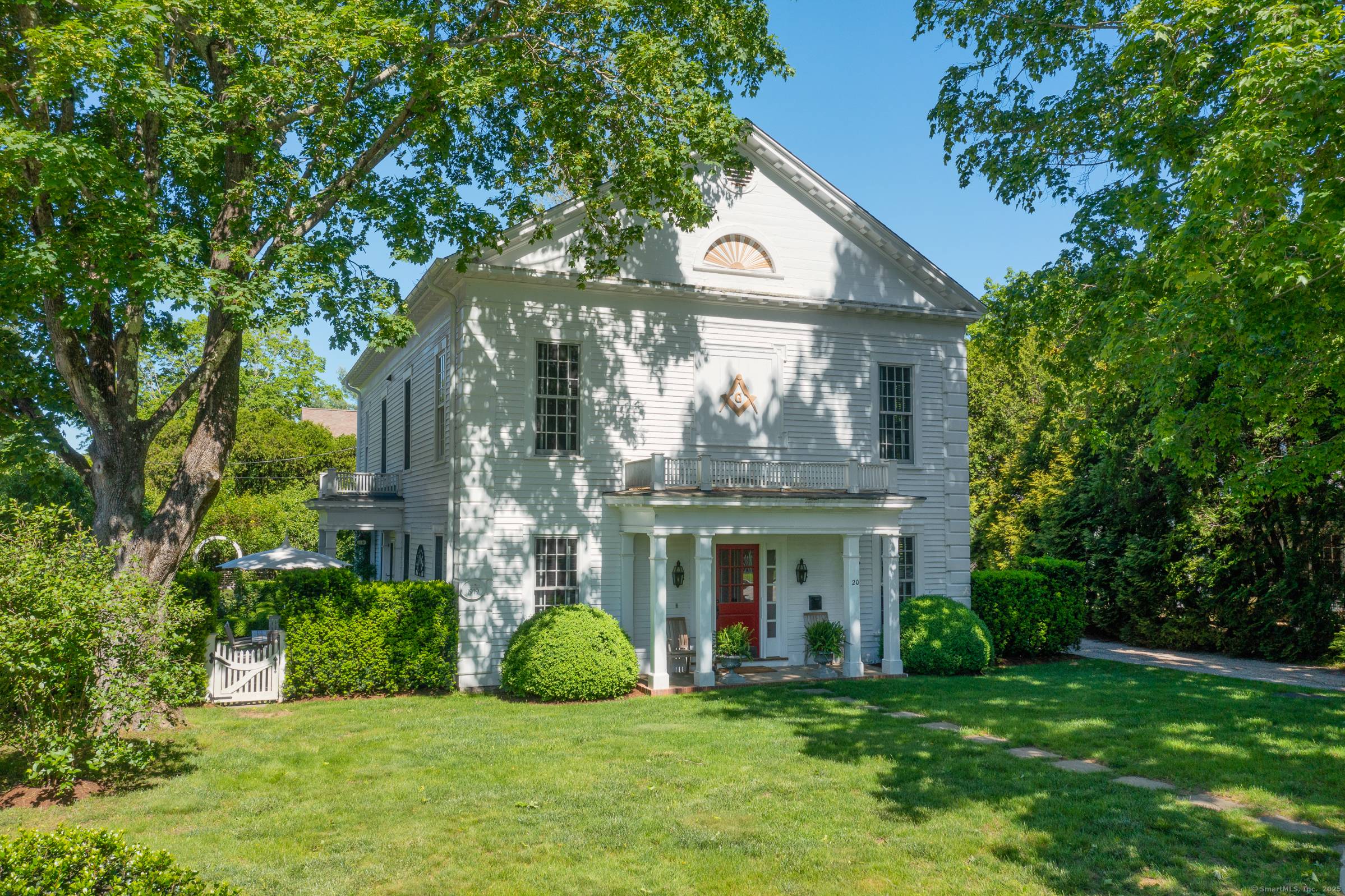 A handsome pristine C1850 4 Bed 3 Bath residence on much revered Lyme St, in the historic village district of Old Lyme.