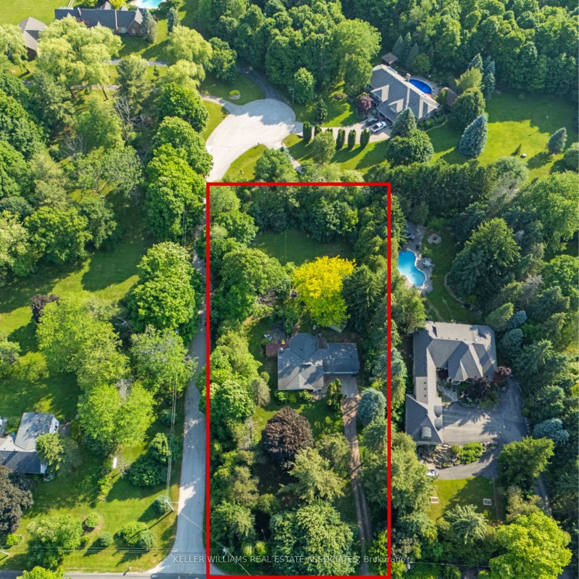 Build your dream home on this rare 1 acre lot tucked into a quiet street in Burlingtons scenic countryside.