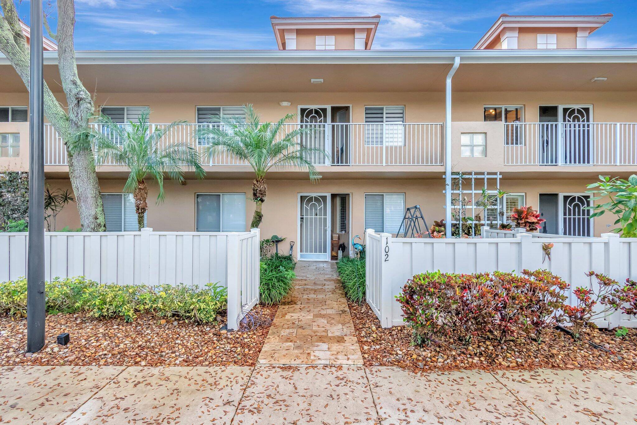 Enjoy the ease of first floor living in this beautifully updated 3 bedroom, 2 bathroom condo in a gated 55 community.