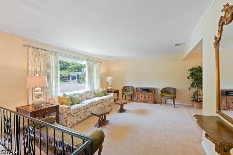 Welcome to this charming split level home located on a quiet cul de sac, featuring 4 bedrooms and 1.