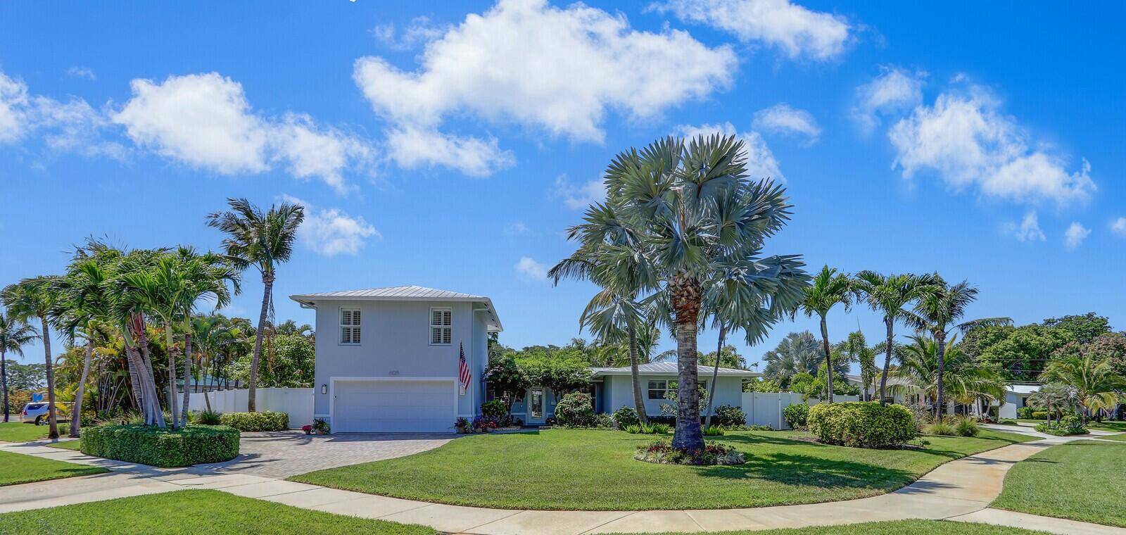 Discover this stunning, fully upgraded home in the sought after Village of North Palm Beach.