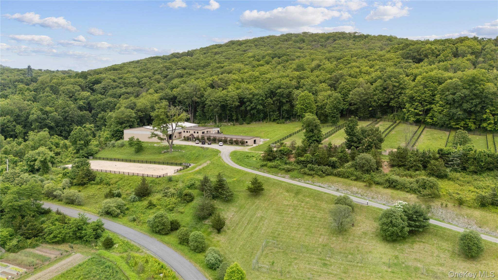 An equestrian paradise on 20 acres just minutes from Metro North and charming Cold Spring village.