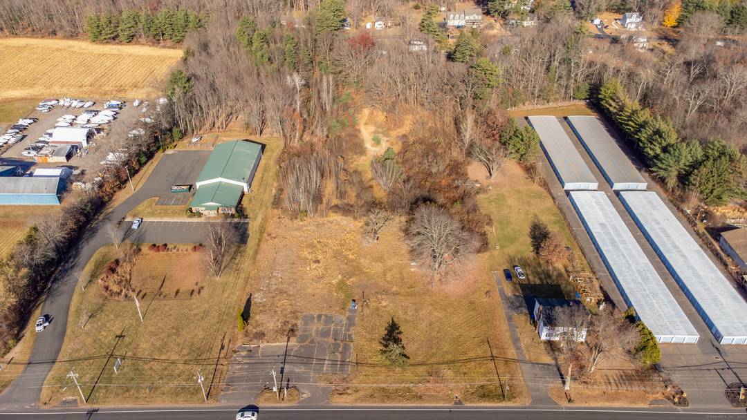 Looking for a level building lot in a thriving commercial and residential area ?