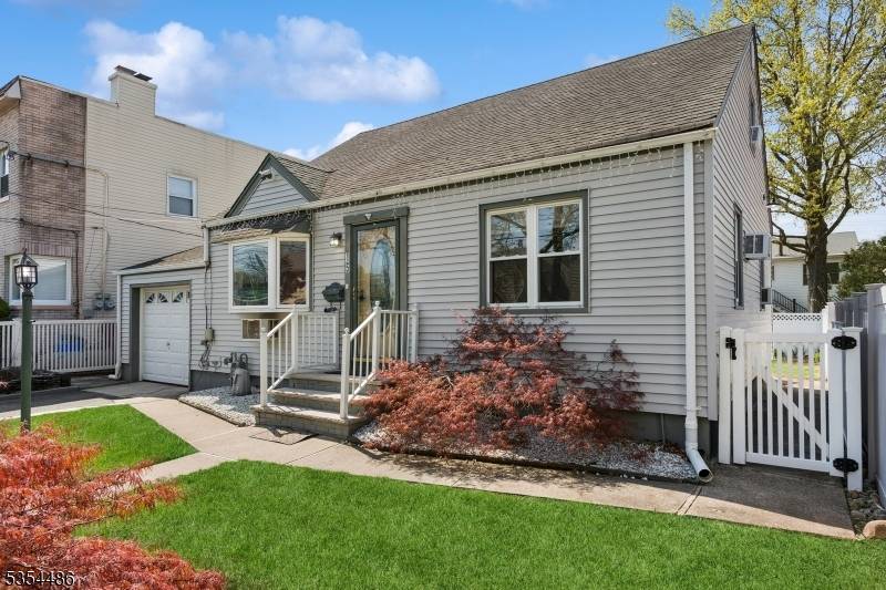 Welcome to this 4 bedroom, 2 Full Bath Custom Cape Cod with 3 floors of living space.