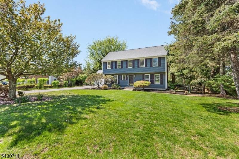 Outstanding Center Hall Colonial set back beautifully on a quiet cul de sac street in the coveted commuter friendly Drakewick section of east Mendham Twp.