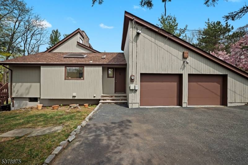 Exceptional Riker Hill contemporary offering a perfect blend of style, space, and functionality !