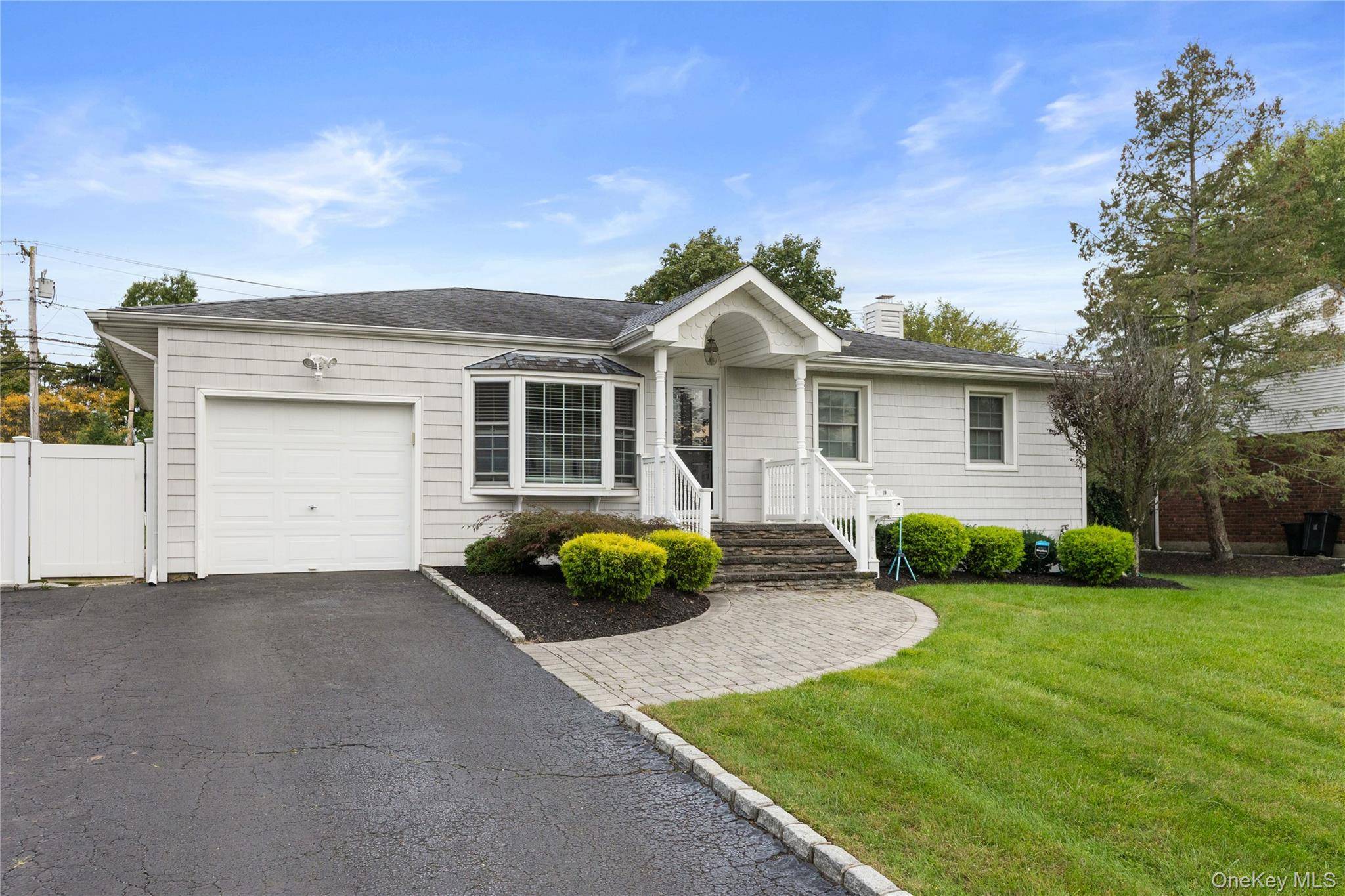 Beautifully updated ranch w open concept layout !