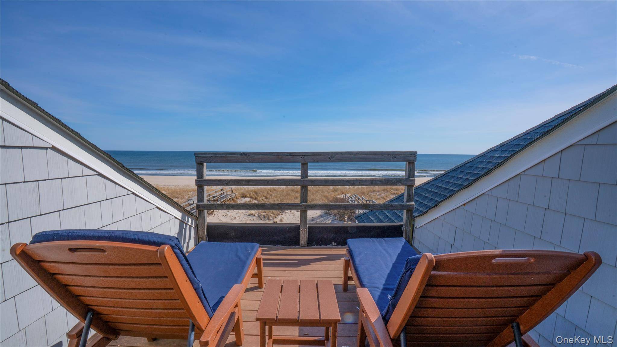 Ocean Escape Your Private Oasis and View of the Sea Step onto your private boardwalk, where the scent of salt air fills your lungs, and the soft whisper of the ...