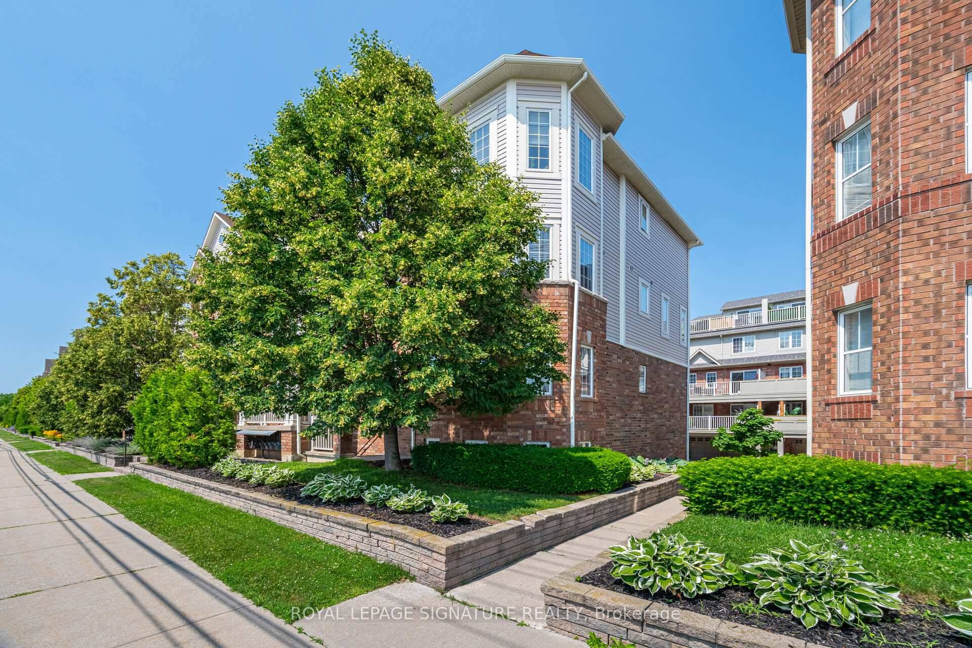 Welcome to 613 Dundas Street, a rarely offered premium corner townhome nestled in the vibrant heart of Mississauga !