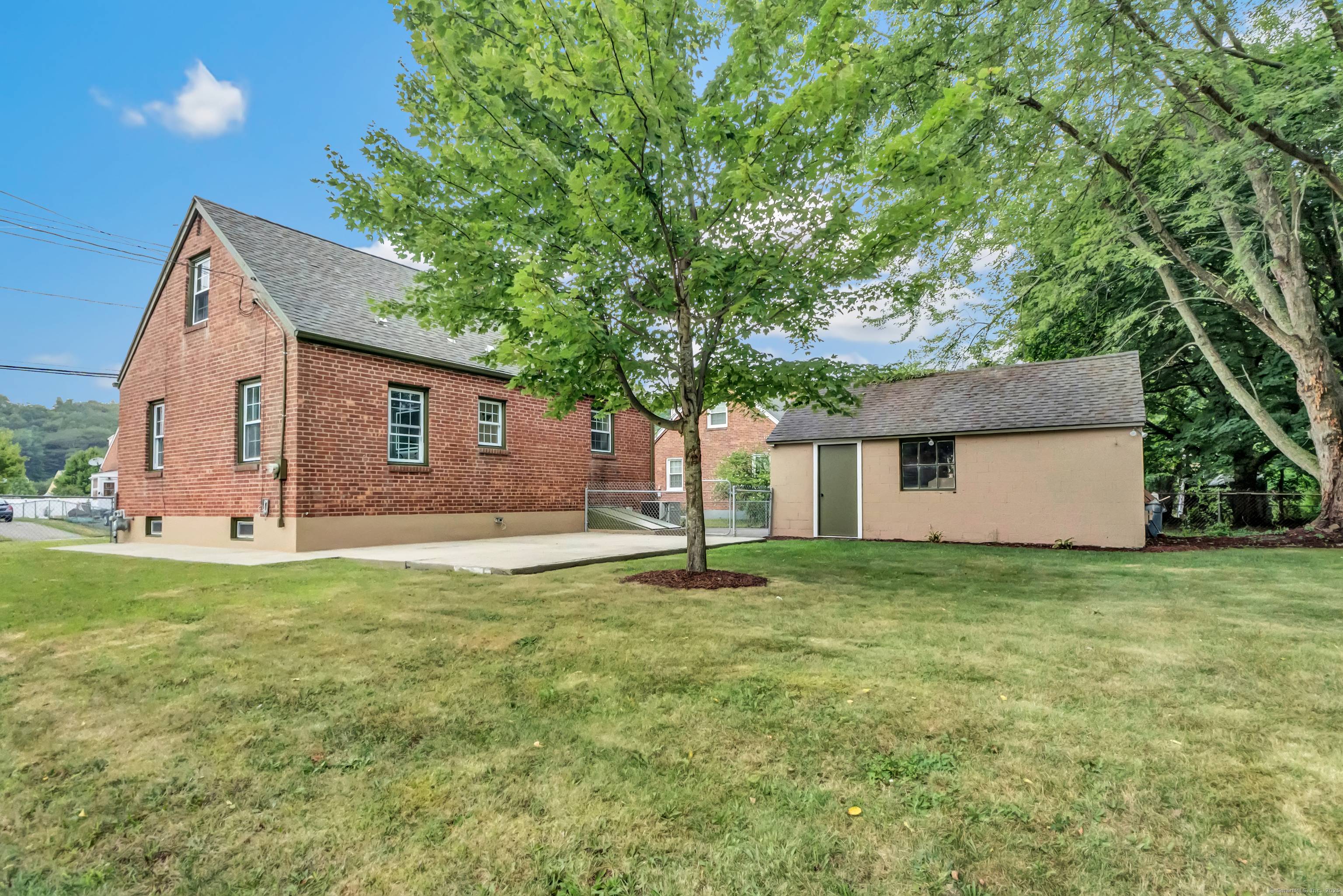 Welcome to this fully renovated Cape Cod on a corner lot with fenced yard and garage.