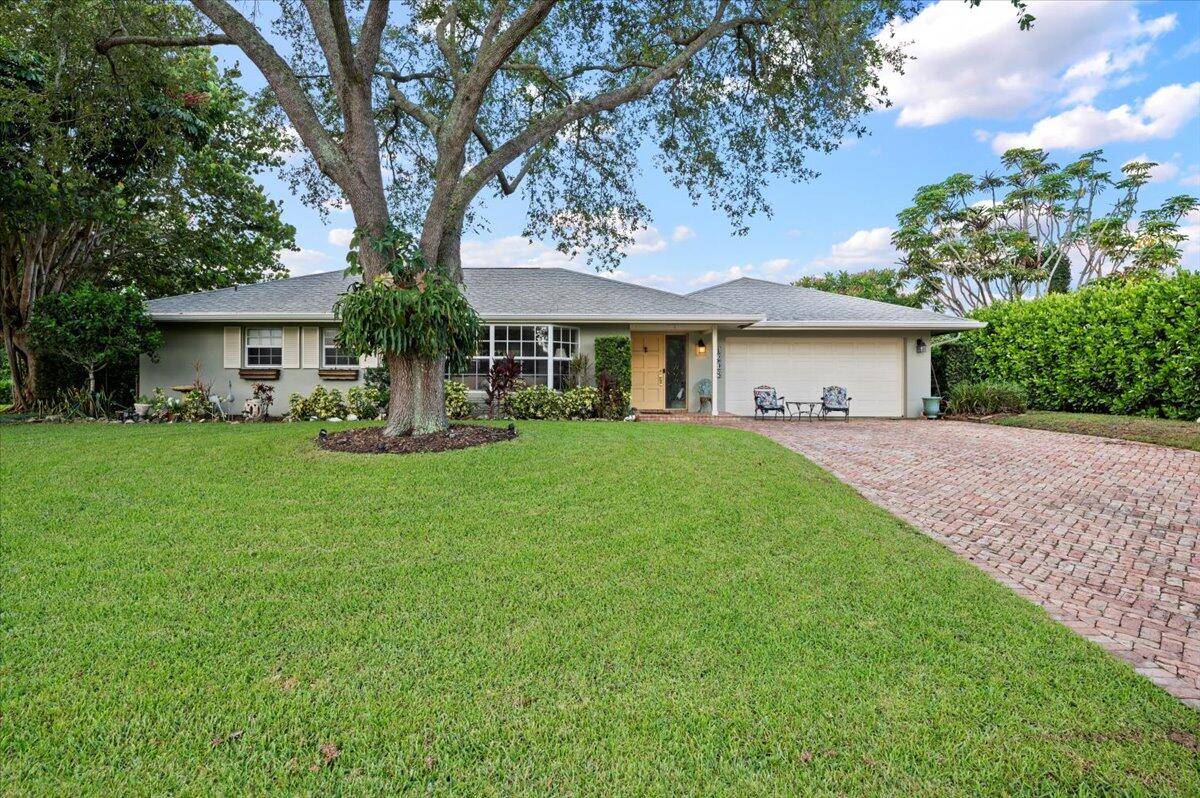 Welcome to this expansive 4 bedroom, 4 bathroom pool home, nestled in the charming neighborhood Garden Isles with a beautiful Chicago brick driveway.