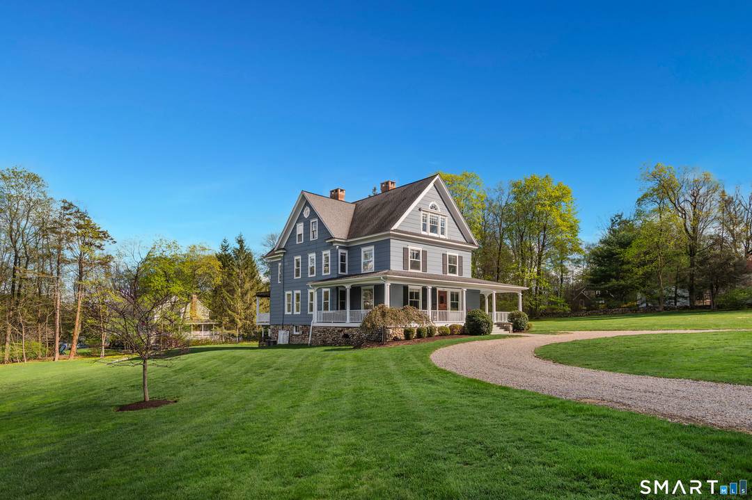 Walk to the heart of Ridgefield from one of its most admired residences.
