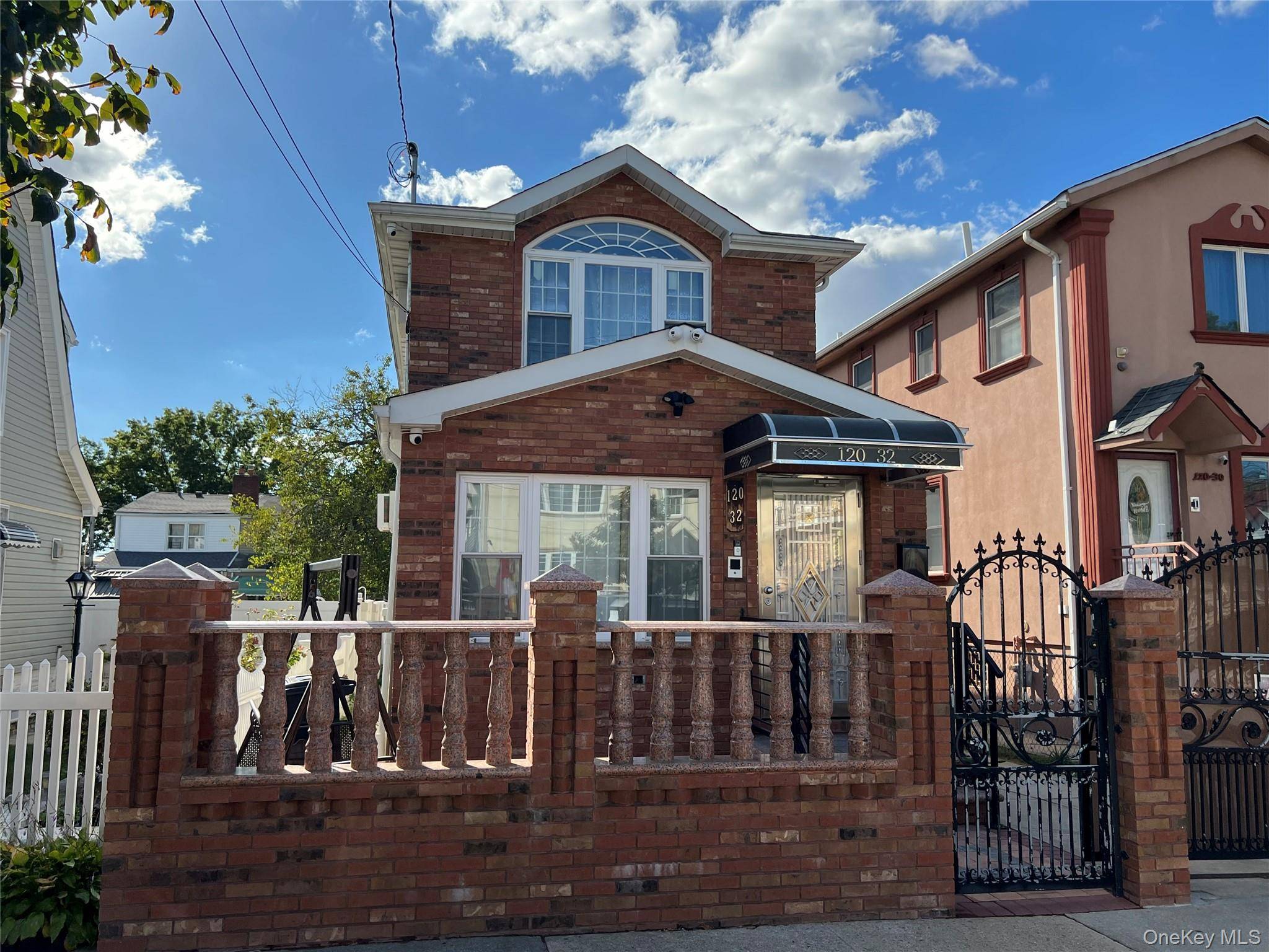 Beautiful 1 family home in the heart of Jamaica, features 3 bedrooms, 2 full baths, private driveway.