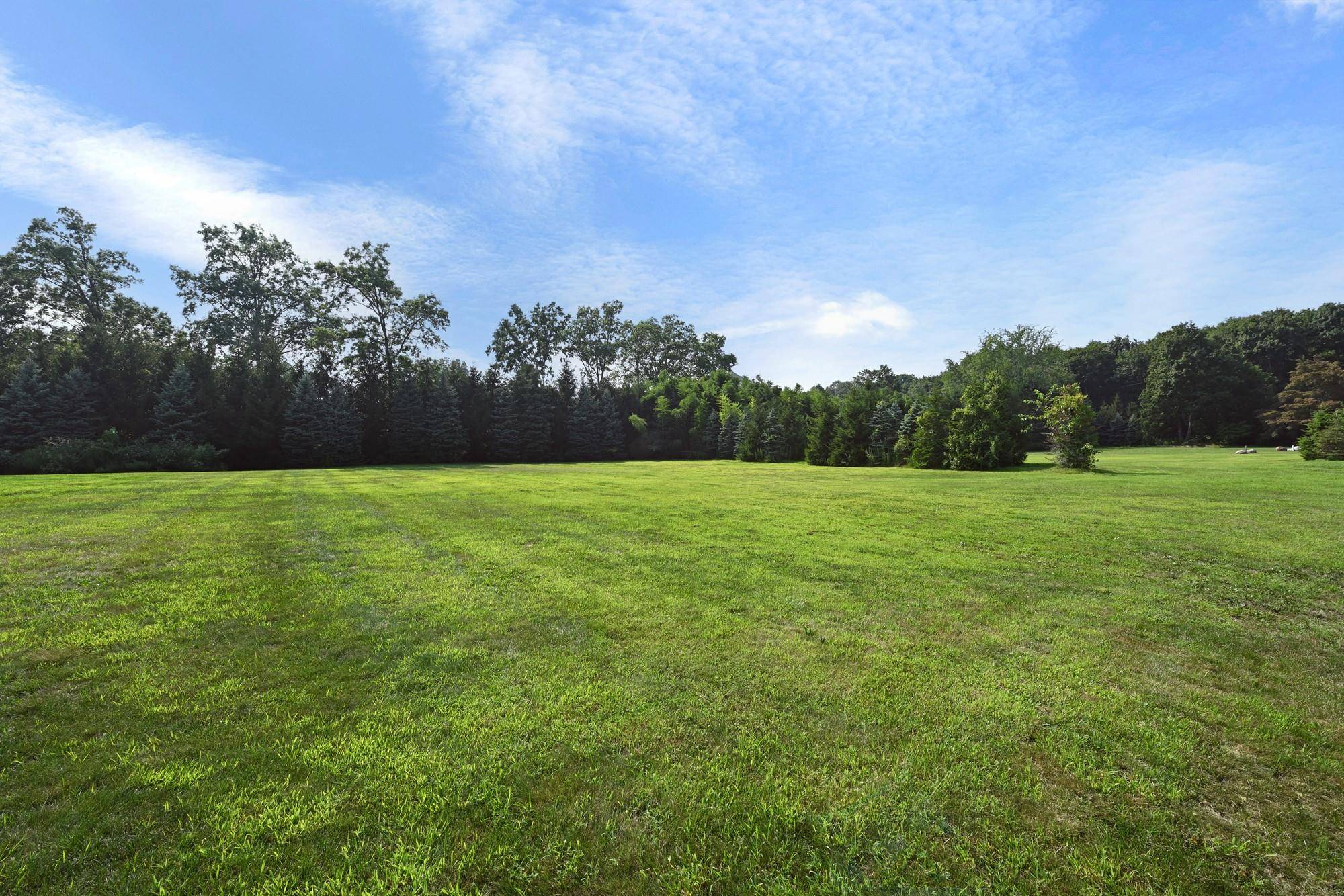 Approximately 3 acres of prime, ready to build land, subdivided into two separate approved lots in one of the prettiest locations in sought after Purchase.