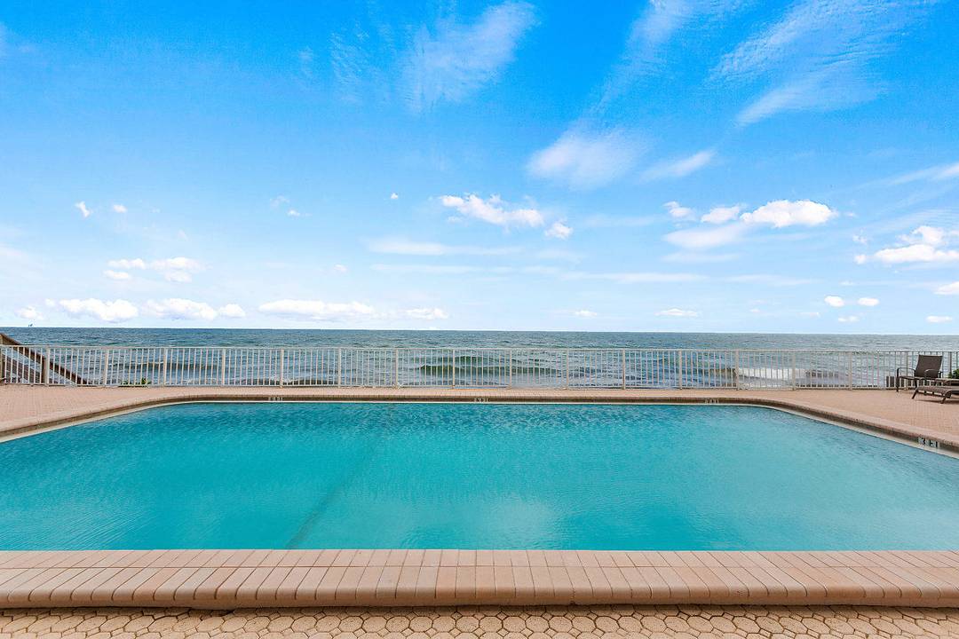 Experience oceanfront living at its finest in this beautifully remodeled South Palm Beach condo.