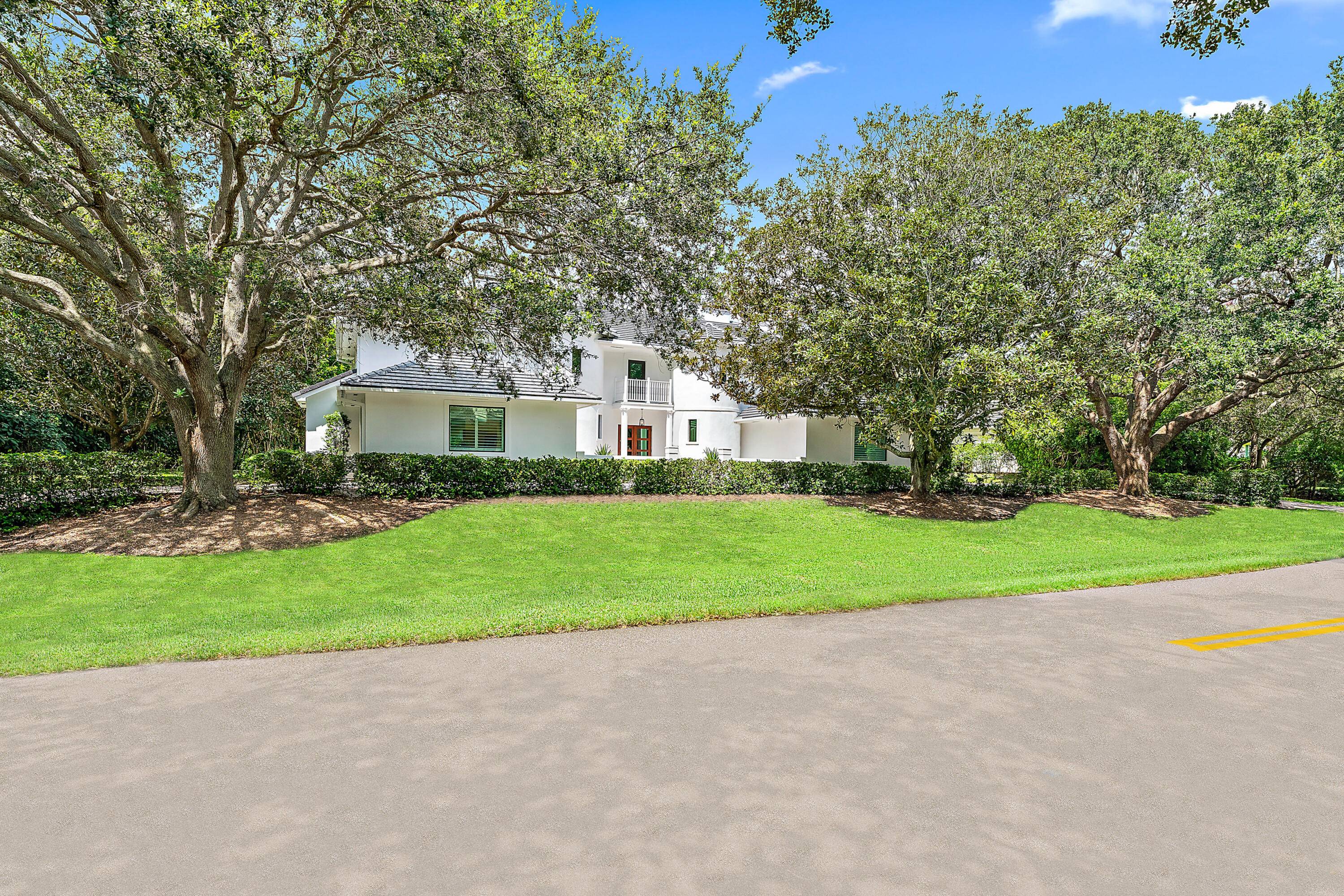 Exceptional opportunity to own a FULLY Renovated Estate home in Exclusive Jupiter Hills.