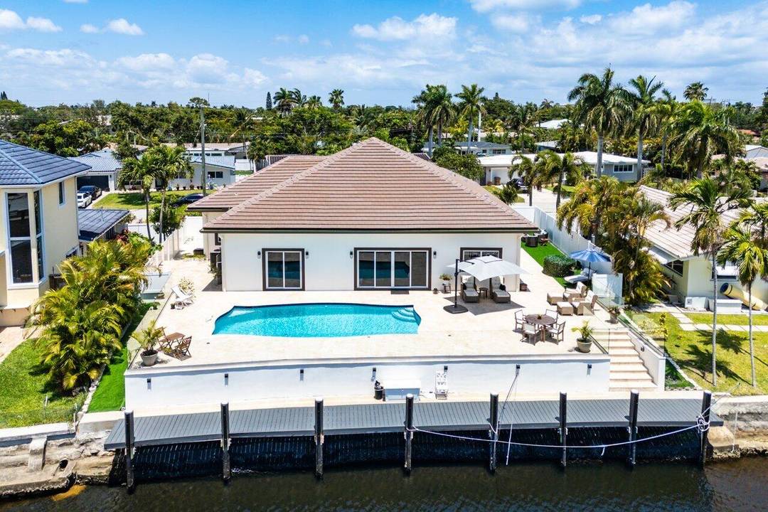 Built in 2023, this exquisite waterfront residence invites you to BRING YOUR BOAT and experience elevated coastal living.