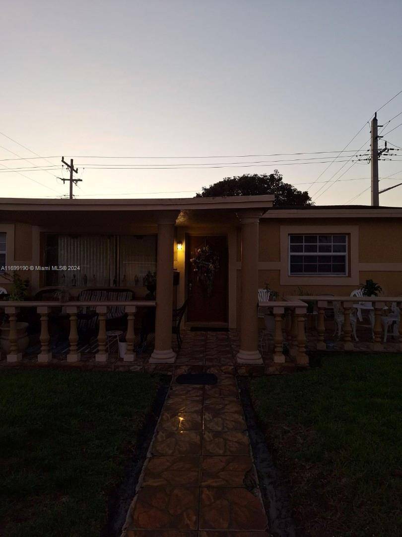 BEAUTIFUL HUGE CORNER HOME WITH AMAZING CURB APPEAL, LARGE FAMILY ROOM, LARGE ENCLOSED PATIO, LARGE YARD AND A LARGE FRONT PORCH to enjoy.