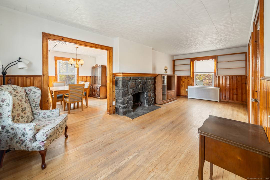 Welcome to 46 South King Street, a charming Cape style home full of character and original mid century details.