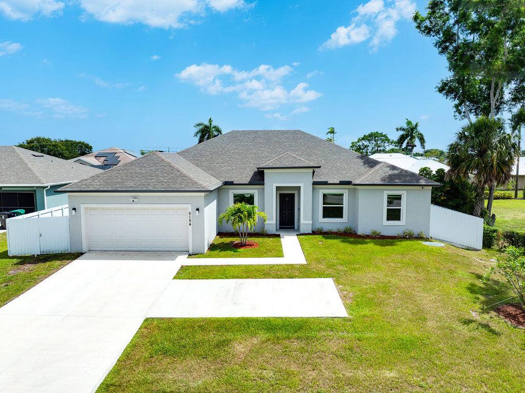 Welcome to 5154 NW North Macedo Blvd ; an exceptionally designed five bedroom, three bathroom single family home with IMPACT WINDOWS featuring the sought after Charlotte floorplan from the Cornerstone ...