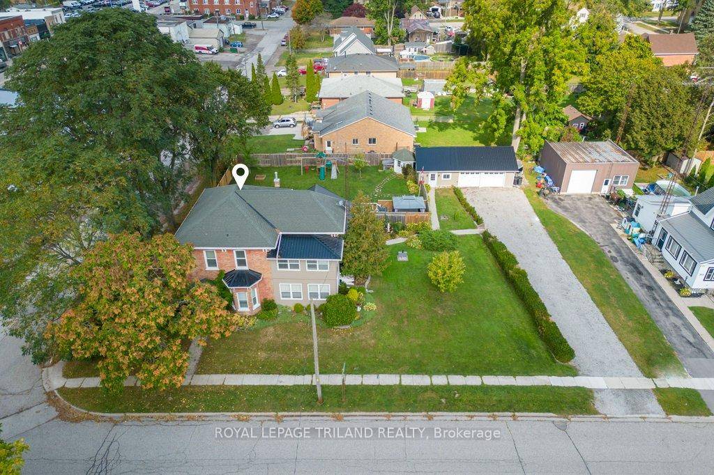 Charming and spacious, this updated 5 bedroom, 2 bathroom century home offers a generous layout on a 0.