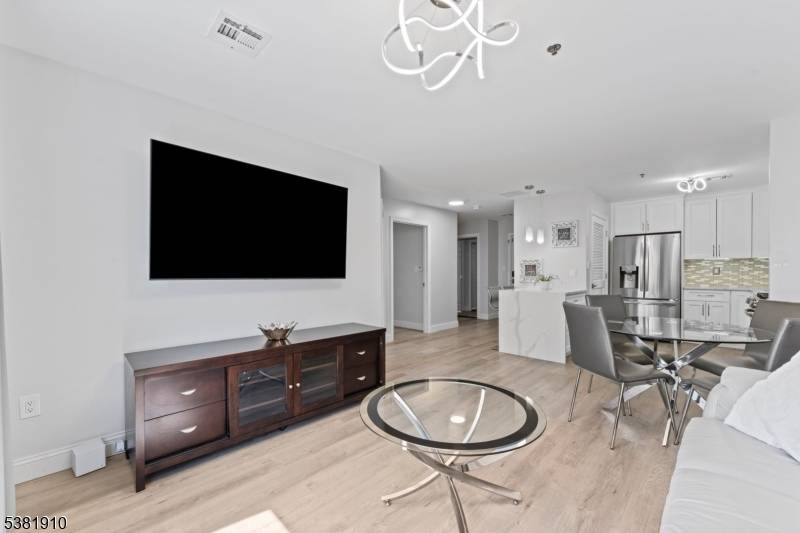 Welcome to this beautifully renovated 2 bed, 2 bath corner unit condo in the heart of Union with a NEW HVAC !