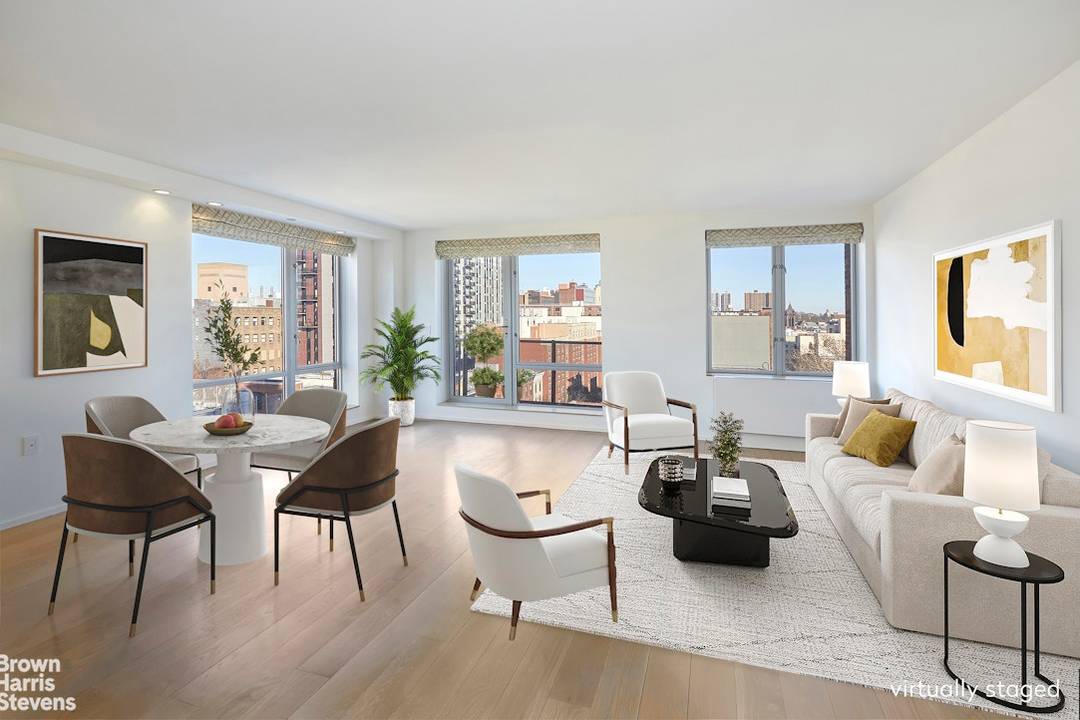 Wide open views insure sun filled days from every room in this chic South Harlem home.