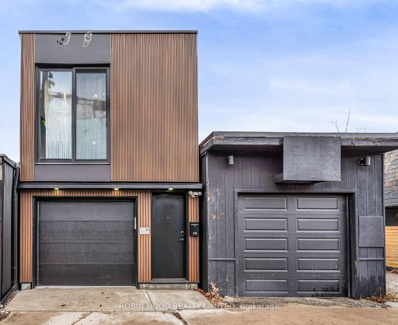 Bright and stylish 1 bedroom laneway suite with a private entrance, featuring high ceilings, a skylight, in suite laundry, and modern finishes throughout.