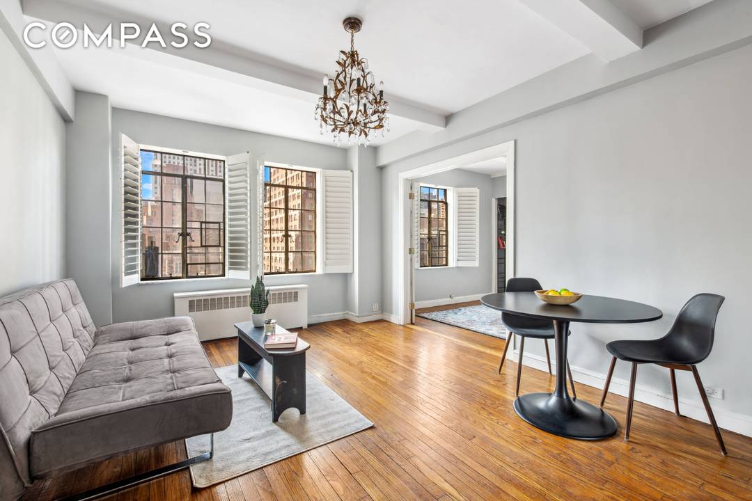 Welcome home to this bright and tranquil corner one bedroom, tucked inside one of Manhattan s most charming pre war buildings.