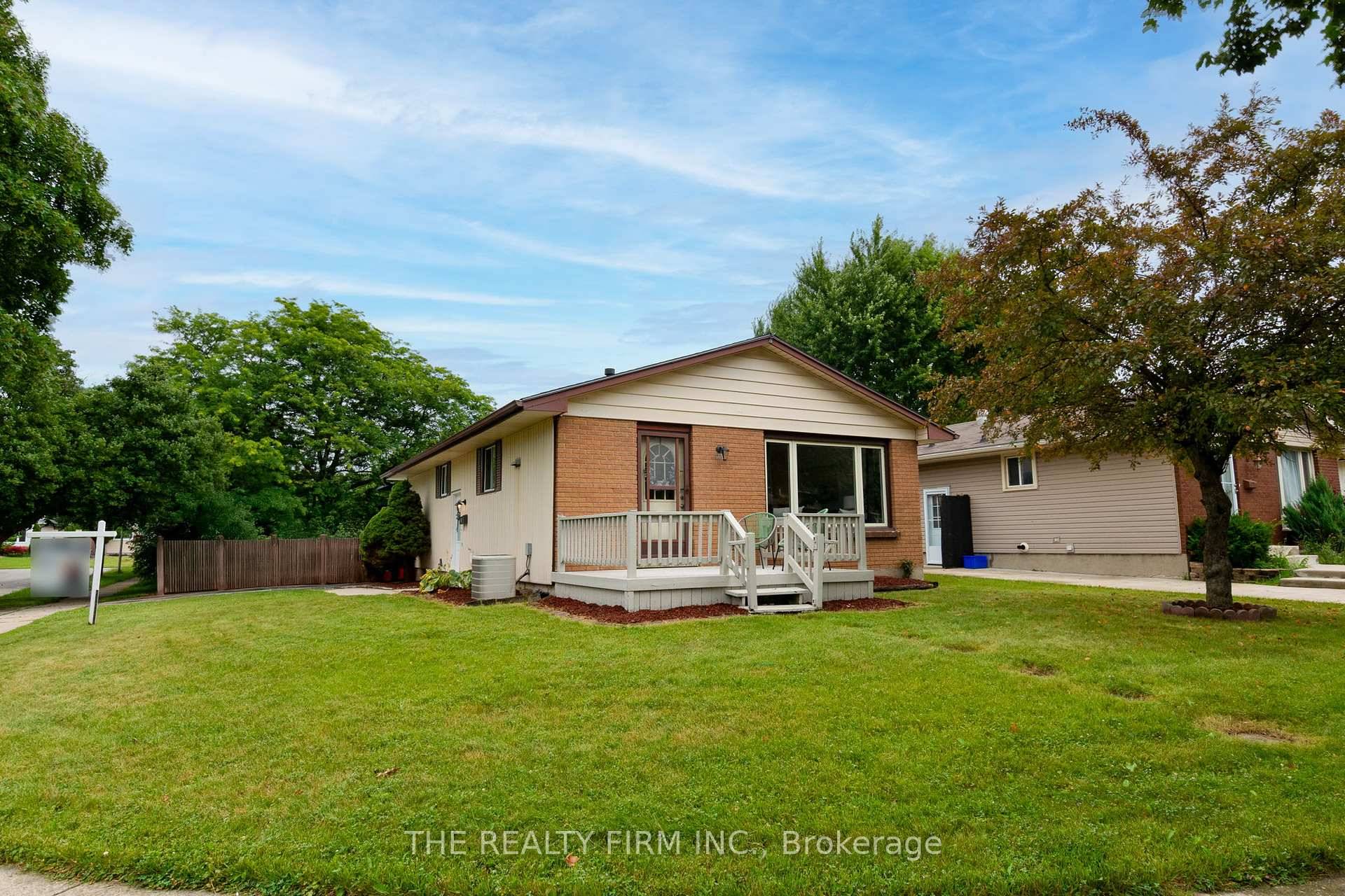 Welcome to this charming South London gem, tucked on a beautiful corner lot with a private, low maintenance yard !