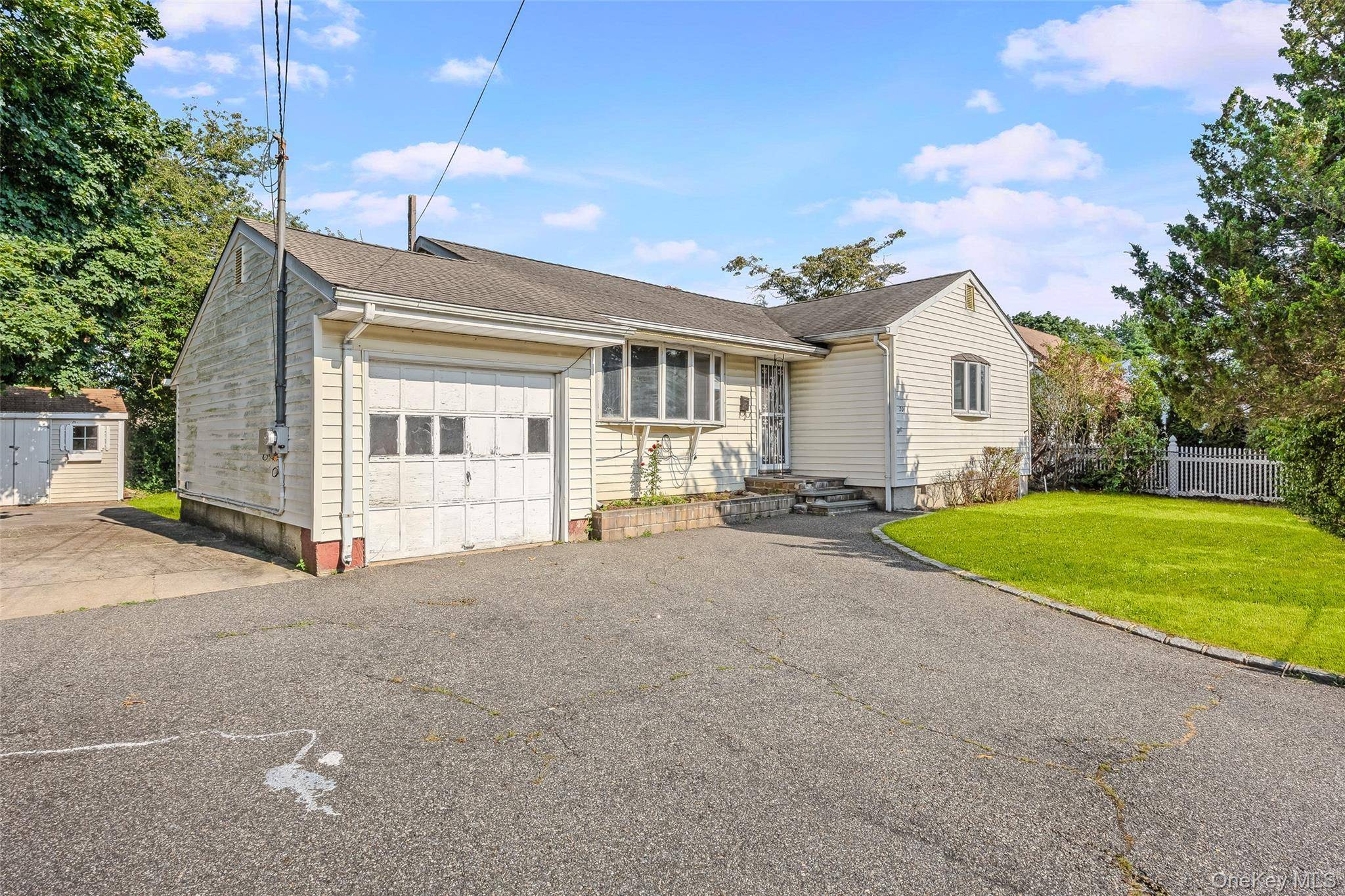 Charming Brentwood Ranch with Endless Potential.