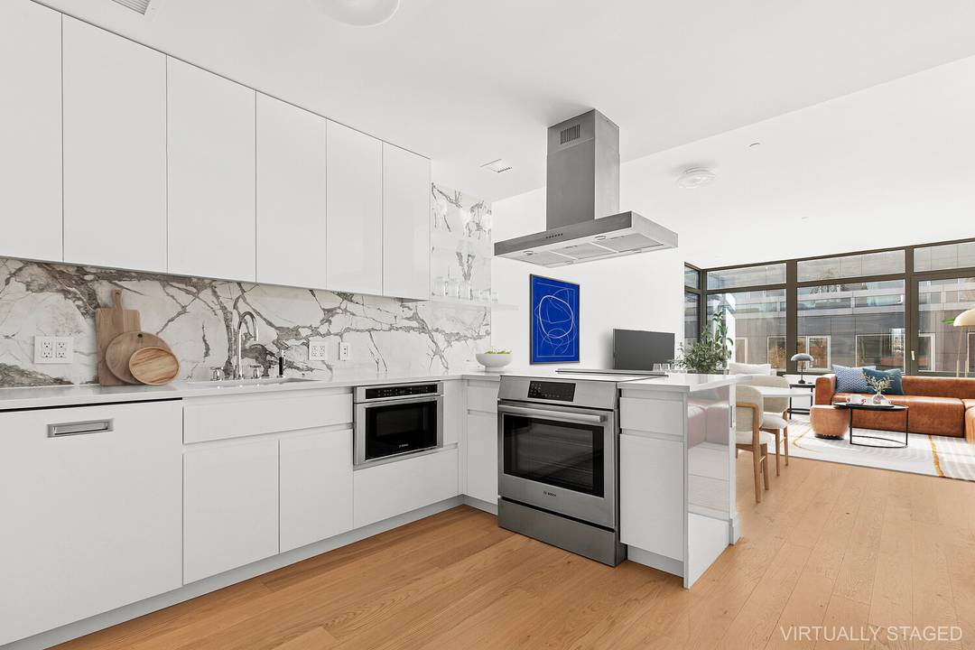 Elevator to your front door, a floor to yourself, a laundry room worthy of a closet organizer, plus a terrace for your morning coffee, a Bosch Appliance package, wide oak ...