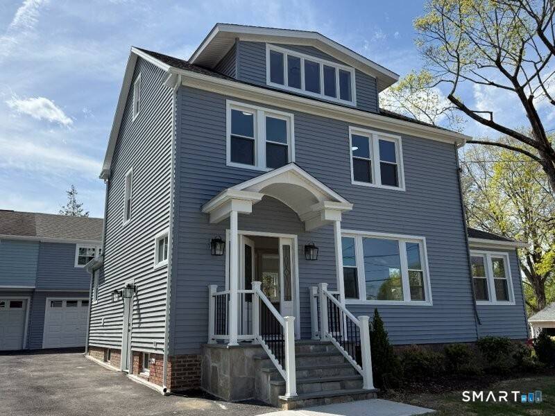 Experience modern luxury in this extensively remodeled Colonial, reimagined from the framing out.
