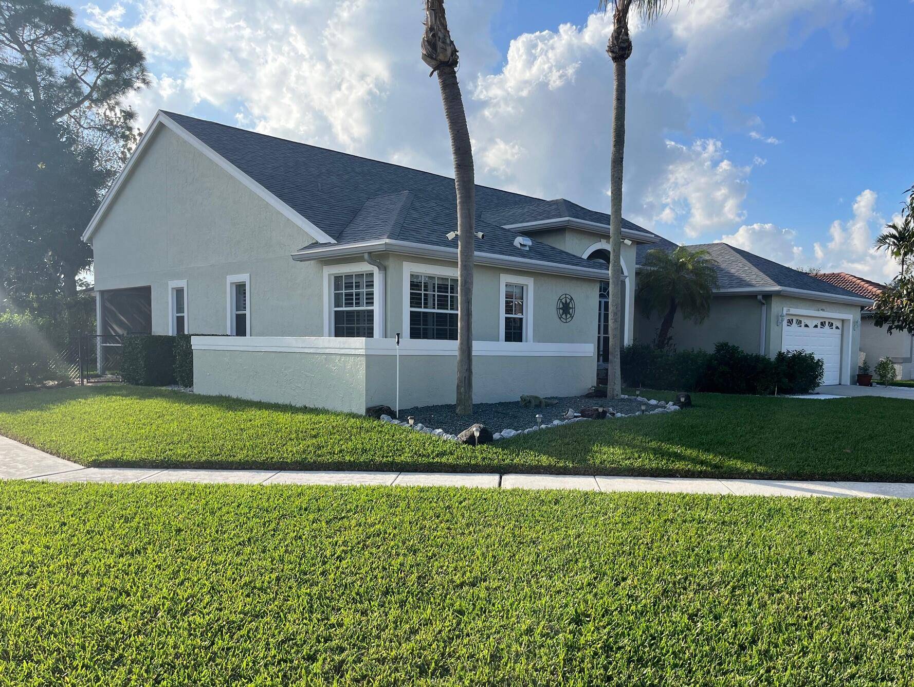 Welcome to this beautifully maintained home, perfectly situated on a quiet corner lot in a sought after community with low HOA fees.