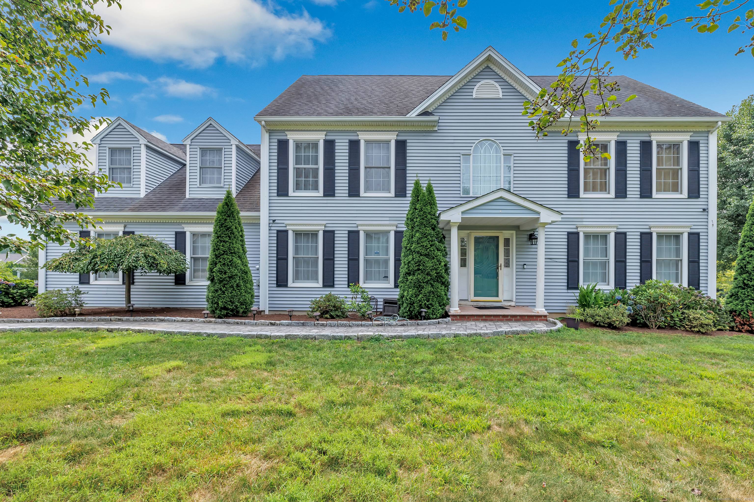 Welcome to this spacious and beautifully maintained Colonial located in a sought after area of Milford.