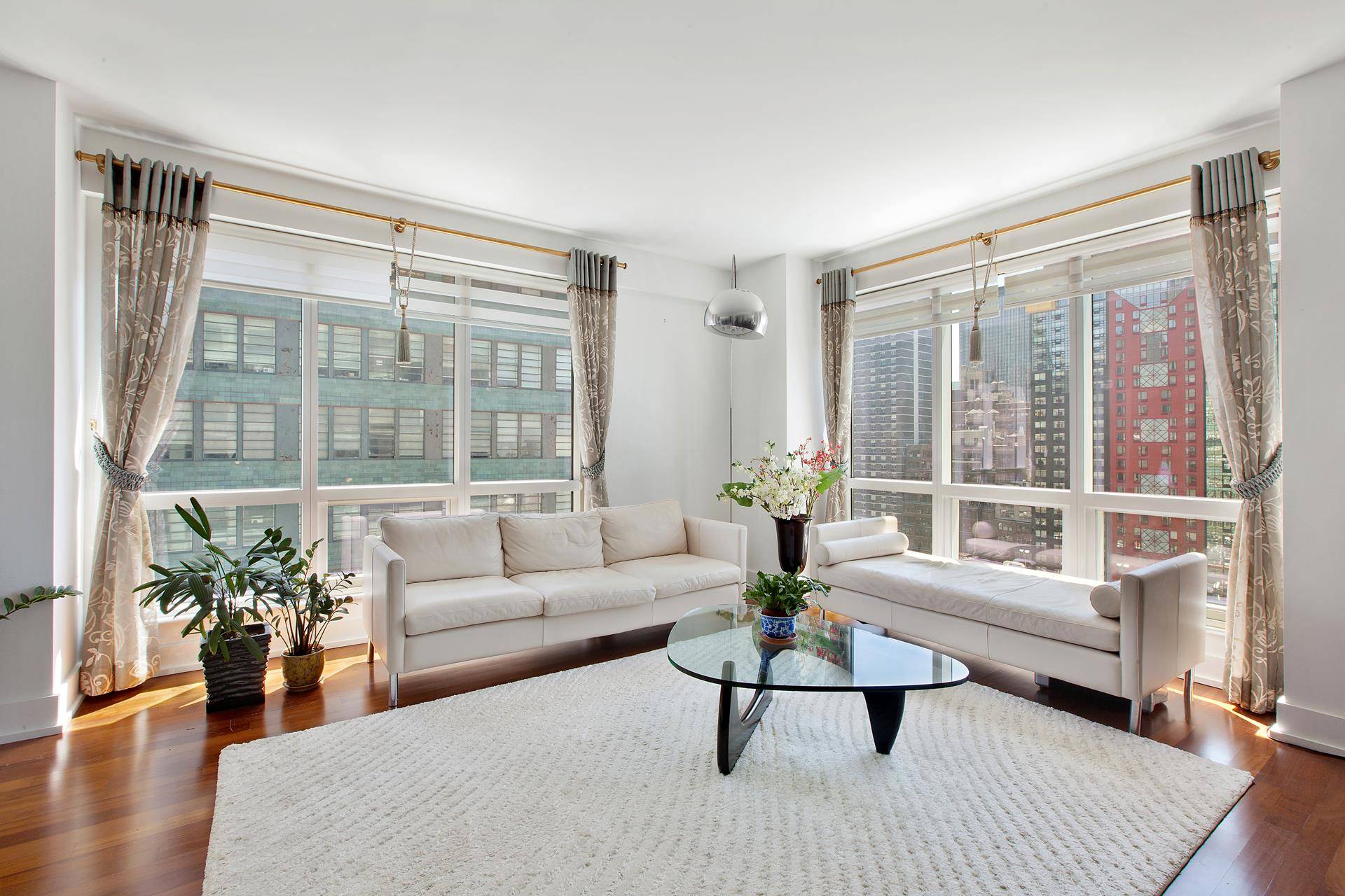 Experience the quintessential city life at 350 West 42nd Street in this 2 bedroom, 2 bathroom meticulously updated condo, located on the 20th floor in the heart of Manhattan with ...