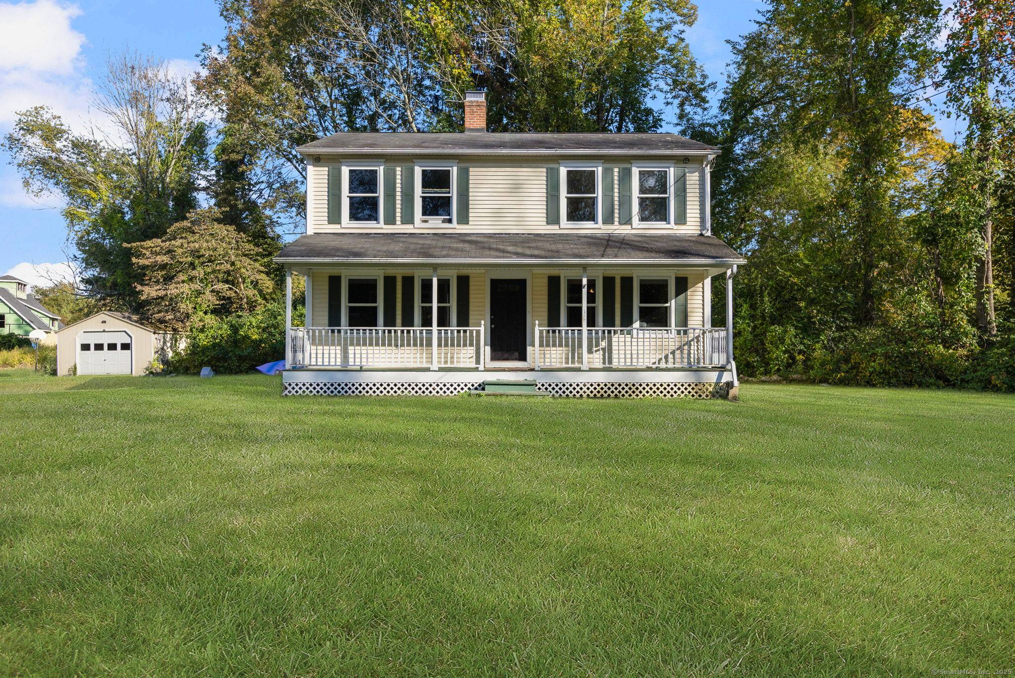 Charming 3 bedroom, 2. 5 bath Colonial set on a picturesque 1 acre level lot bordered by a stone wall.