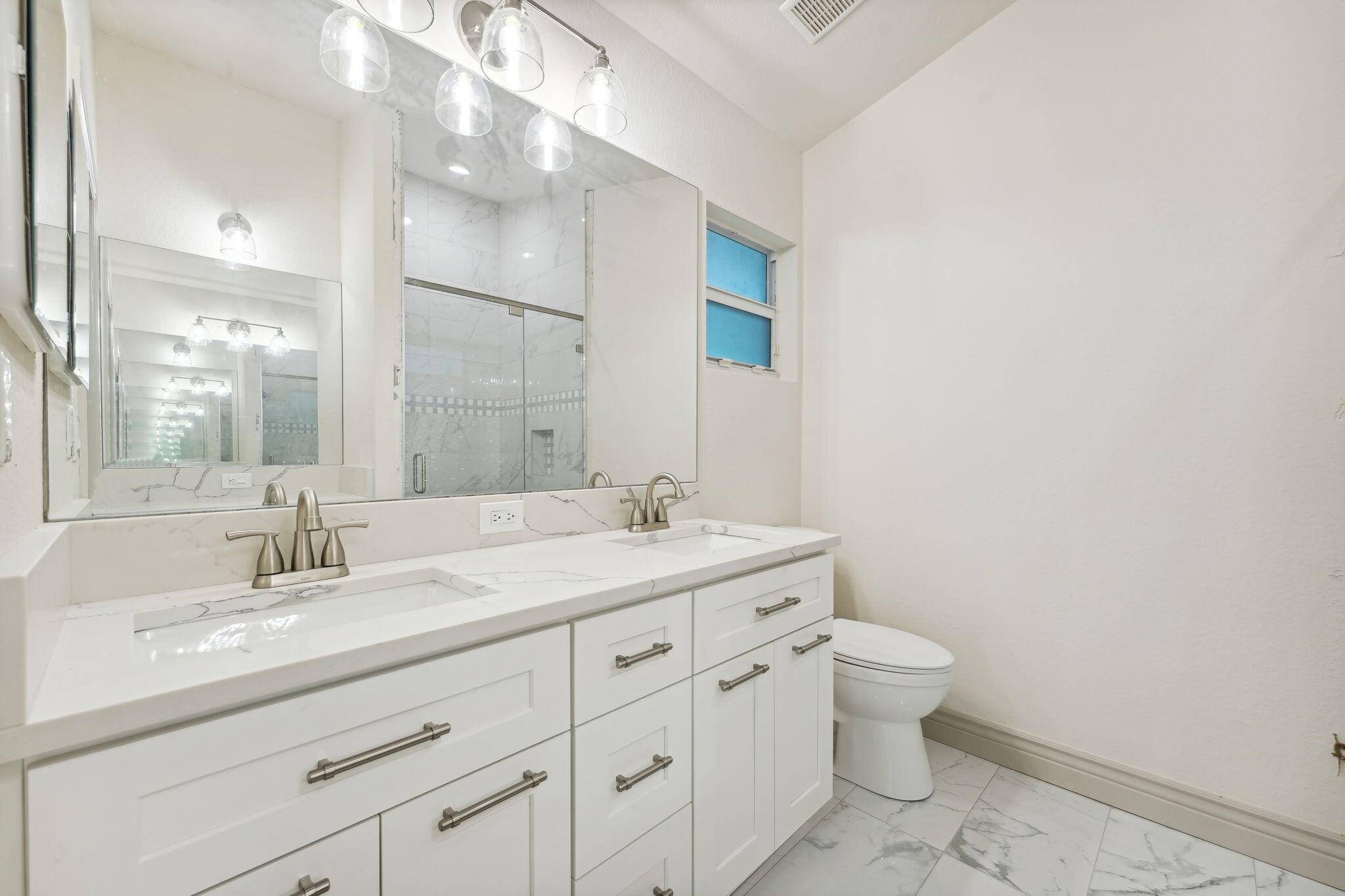 TOTALLY RENOVATED HOME. IT CHECKS ALL THE BOXES.