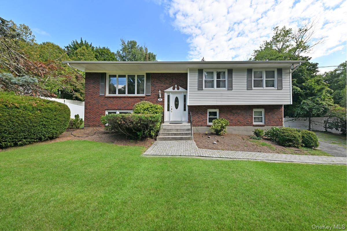 Discover this spacious raised ranch in the heart of Montebello, offering 5 bedrooms and 3 full baths on nearly an acre of beautifully flat property.