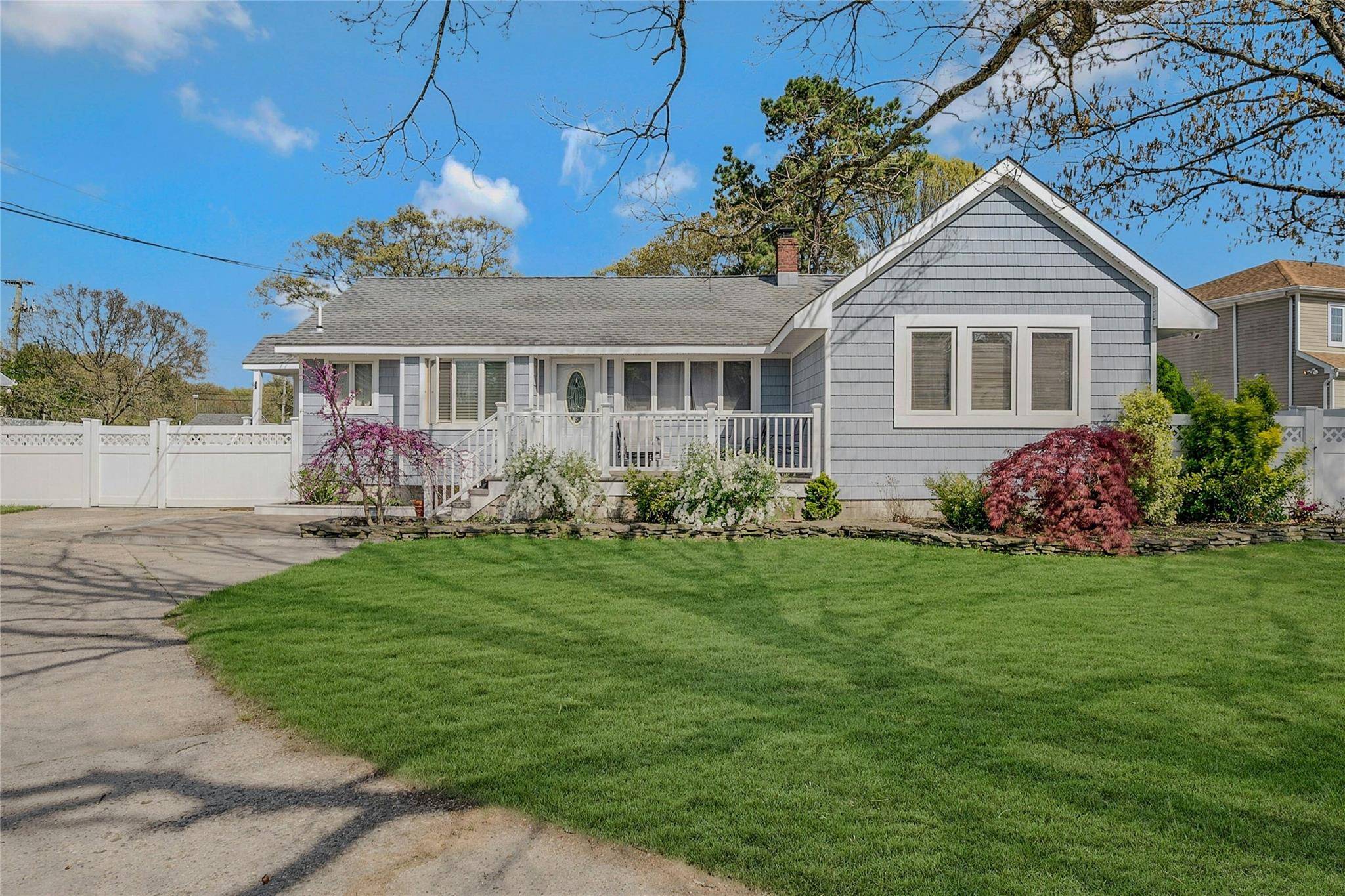 Welcome to this beautifully maintained 3 bedroom, 2 bathroom home, nestled on a spacious 0.