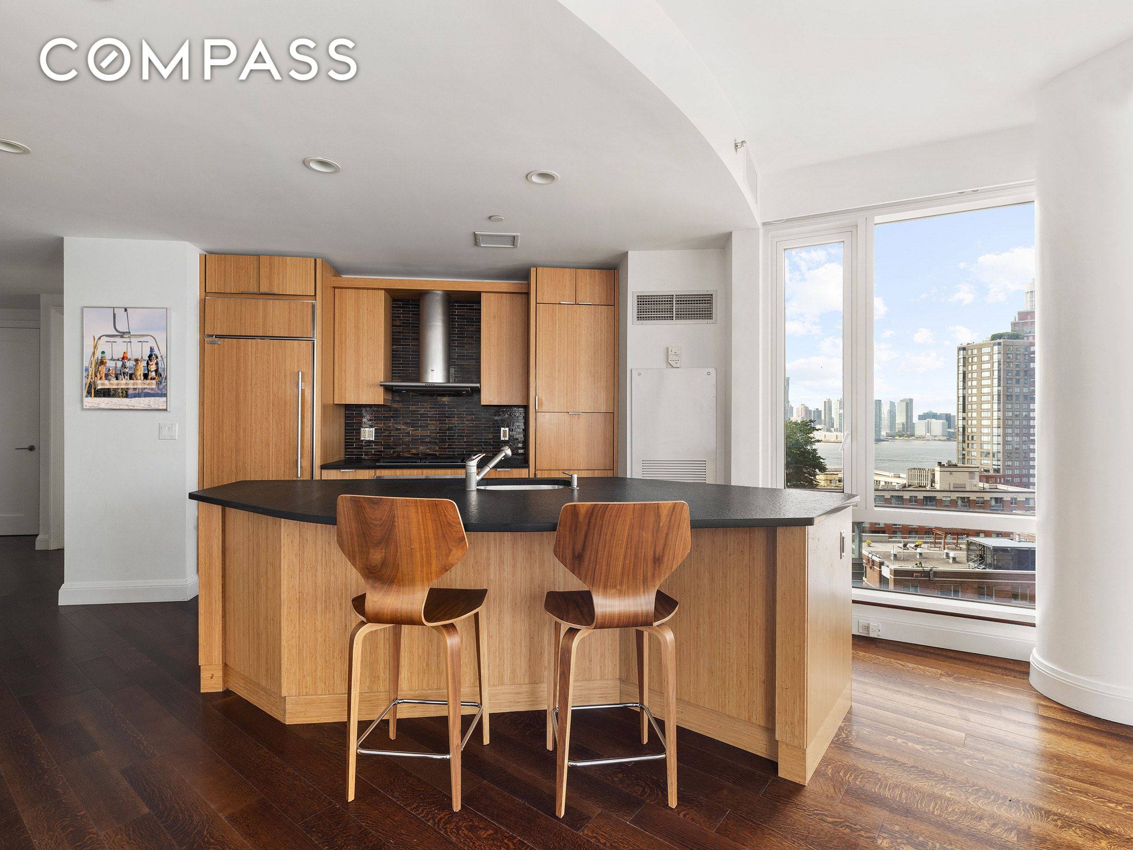 This exquisite corner two bedroom two bathroom apartment offers breathtaking views of the Freedom Tower, city skyline, and the western Hudson River, all designed by renowned architect Pelli Clarke Pelli.