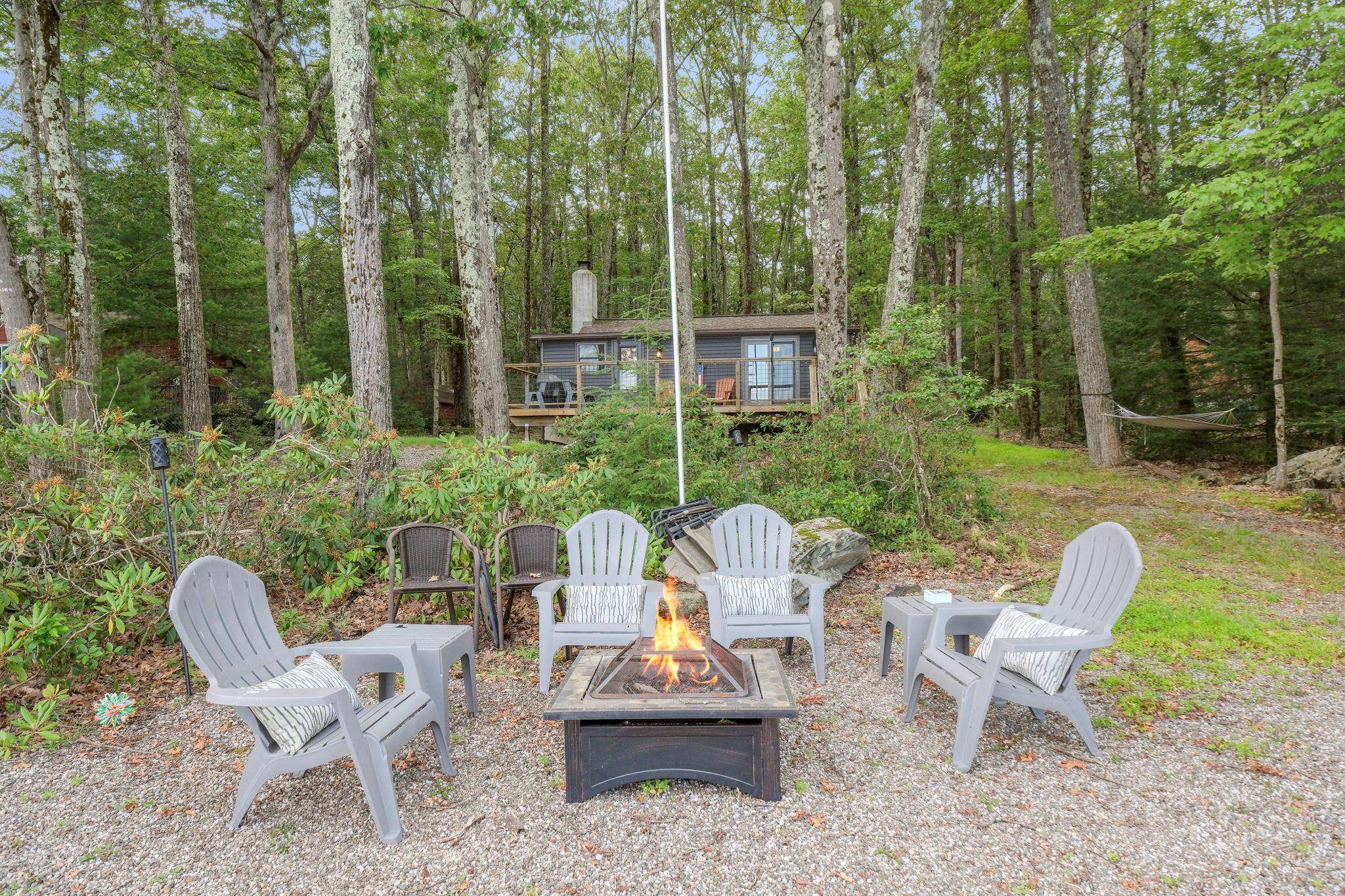 Breathtaking lake views await at this fully renovated Wolf Lake retreat.