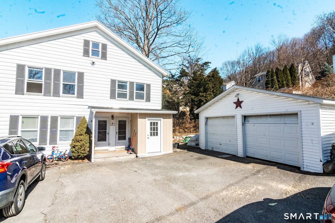 Discover this charming two family home in the heart of New Milford.