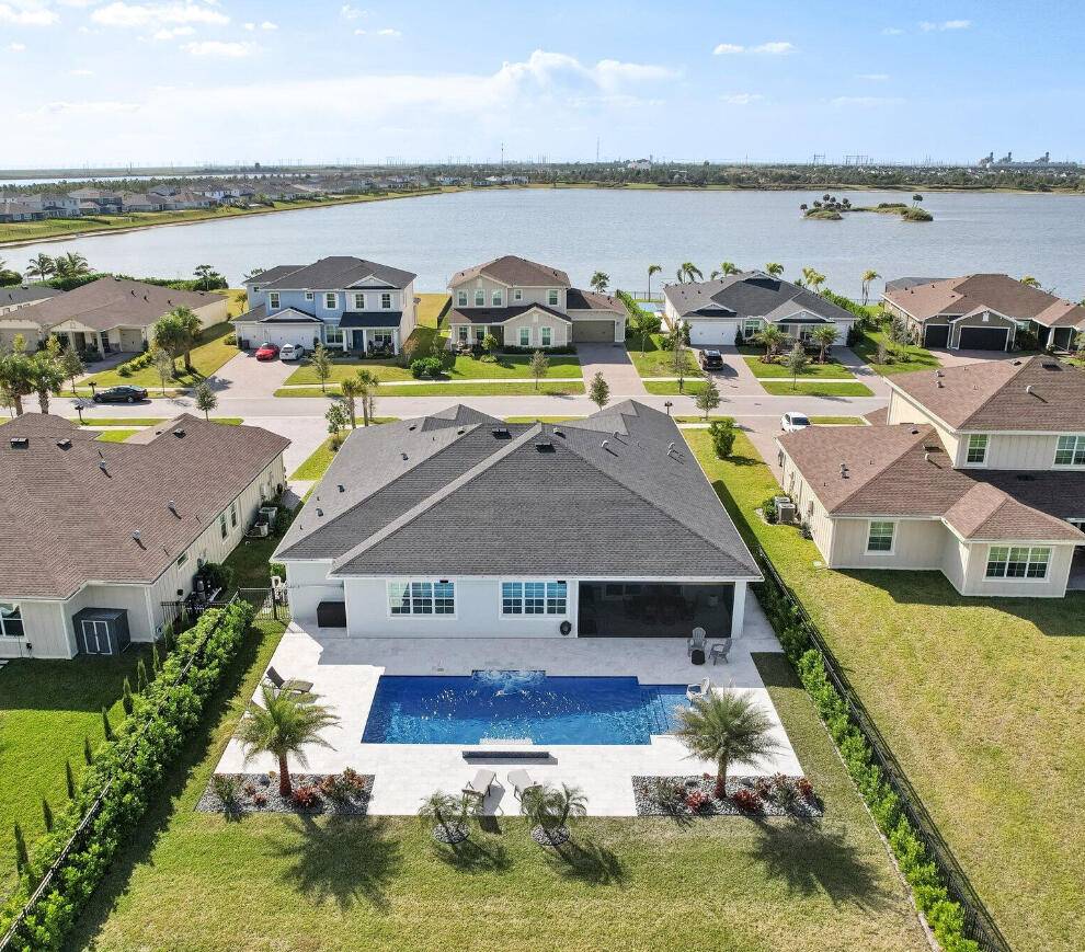 Located in the sought after Arden community, this exceptional one story Flora model offers a transitional Floridian design with luxury upgrades throughout.
