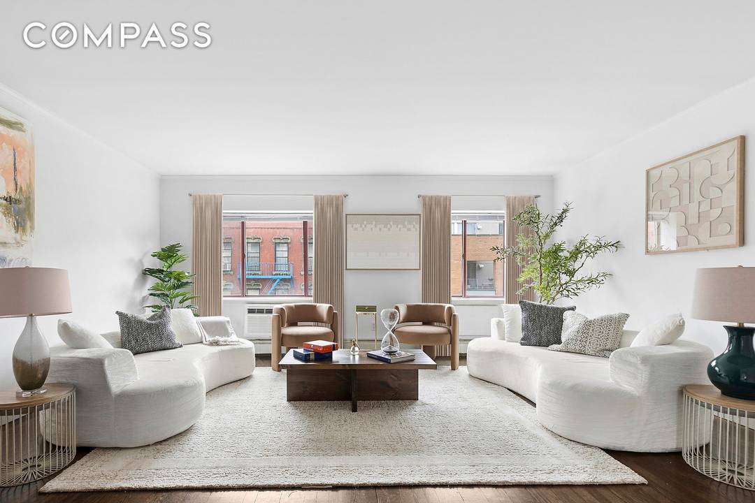 Sun filled 2 bedroom, 2 bathroom residence in the heart of the East Village.