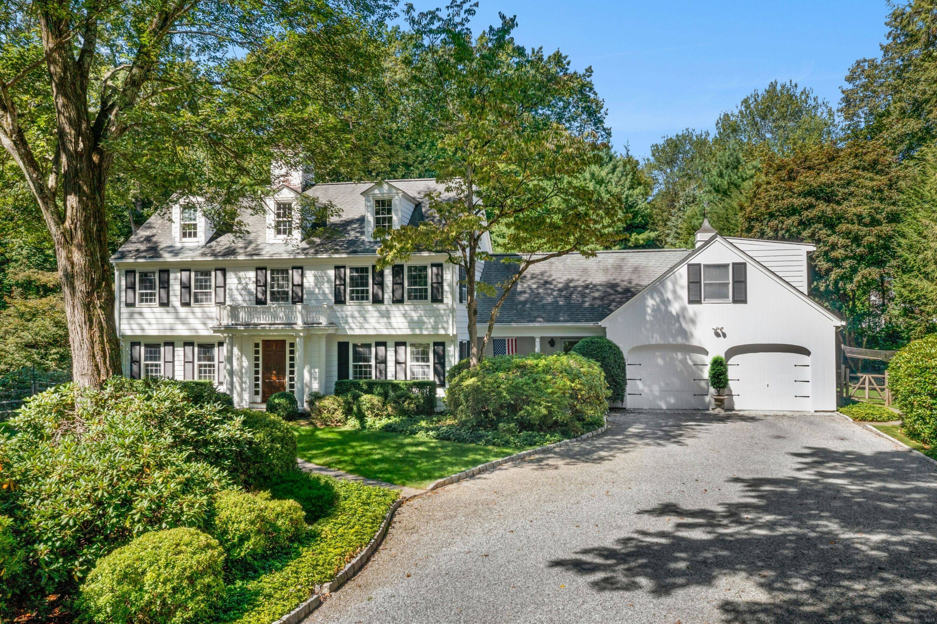 Situated on over two acres on one of New Canaan's most coveted cul de sacs, this five bedroom Colonial offers gracious living in a serene west side setting.